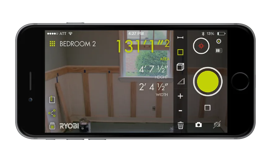 The laser distance measurer turns a raw length into area and volume, overlaid on the live camera view.