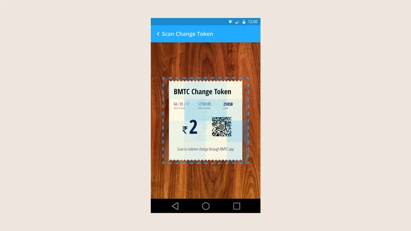 The redeemable BMTC change token on screen, scanned into a rider's wallet so no change is lost