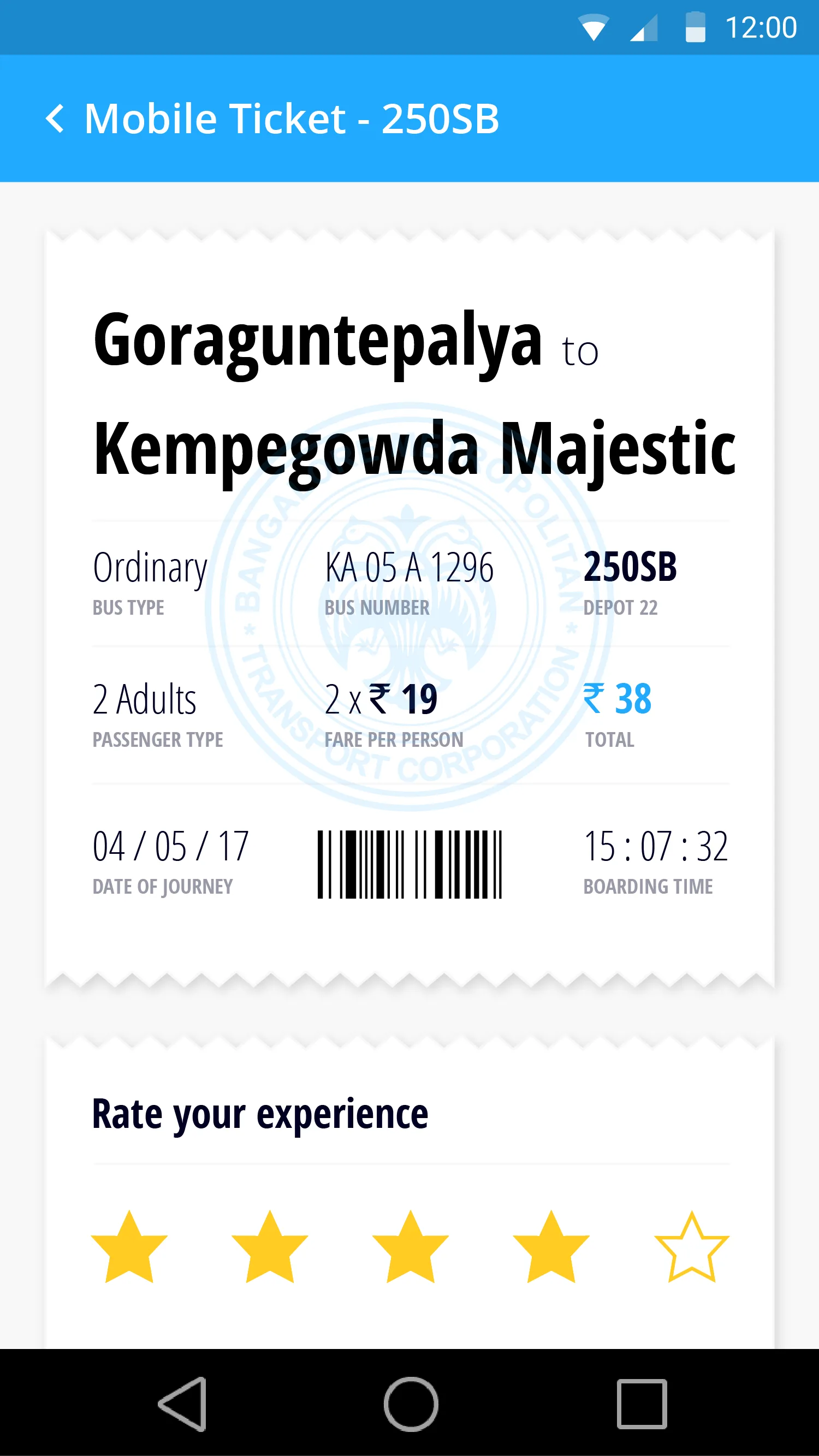 A BMTC mobile ticket: route, bus number, fare and a scannable barcode.