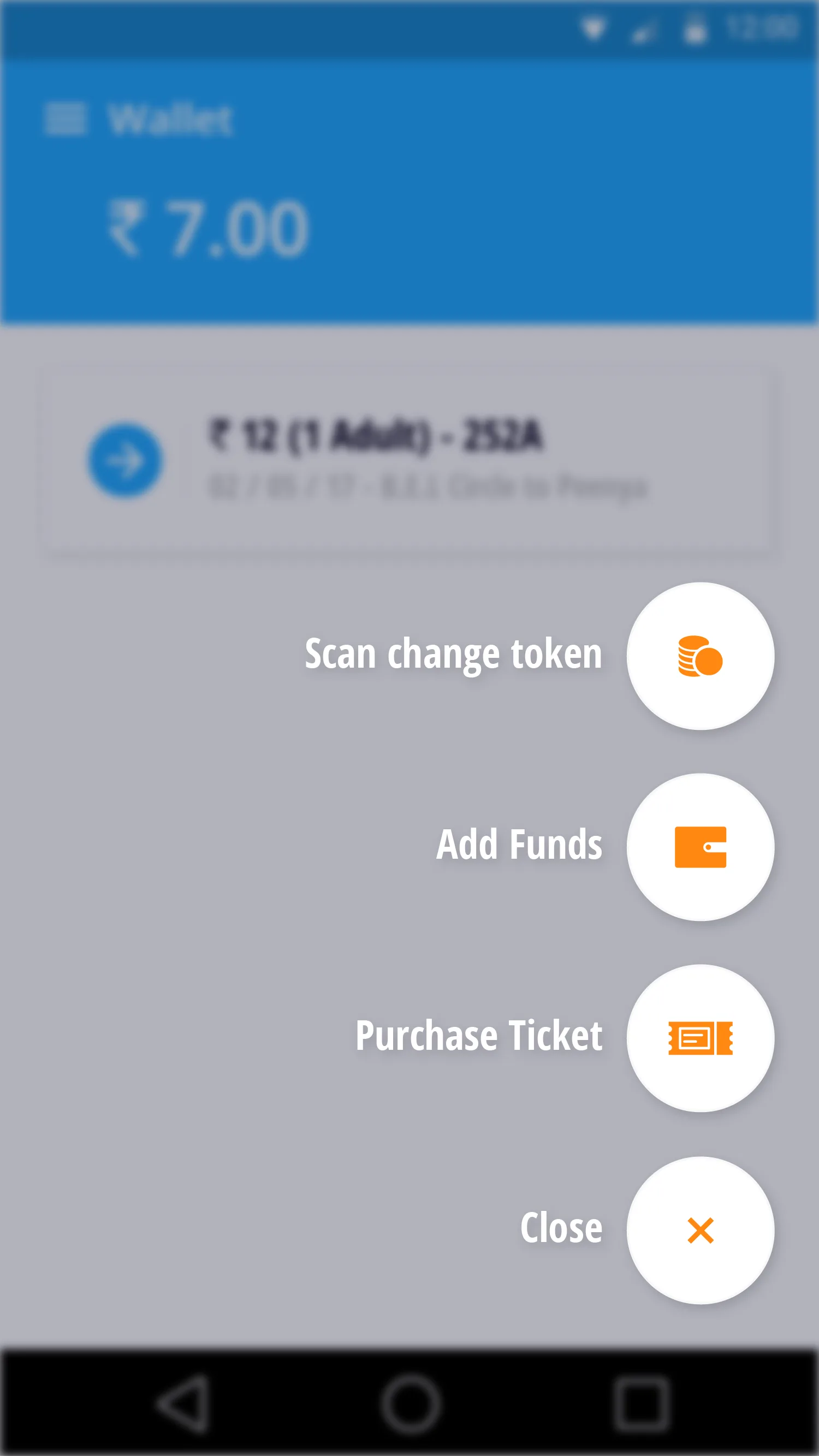 The redesigned BMTC wallet with a radial action menu: scan a change token, add funds, or buy a ticket.