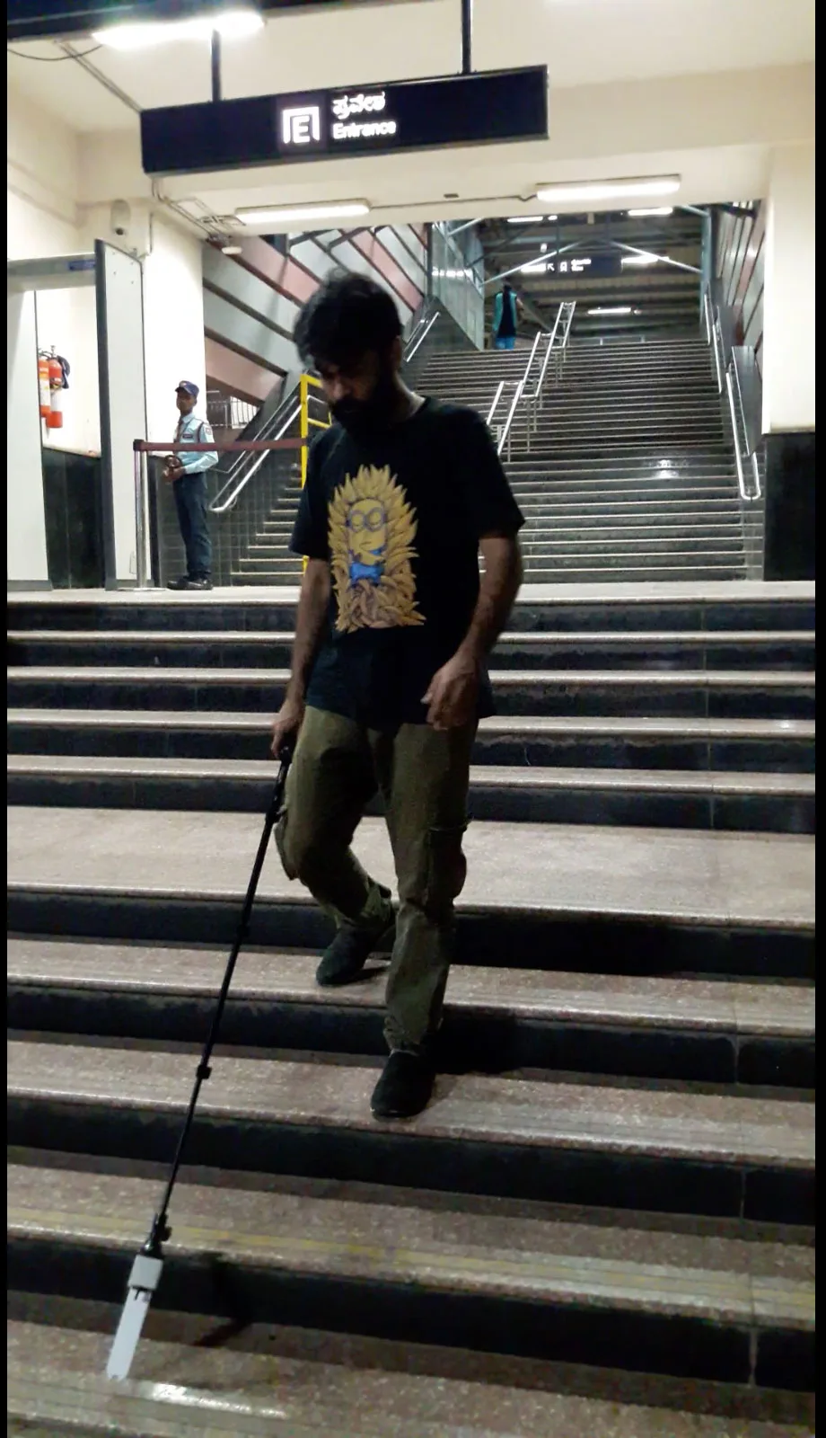 Testing the cane on a live route, reading a flight of metro stairs.